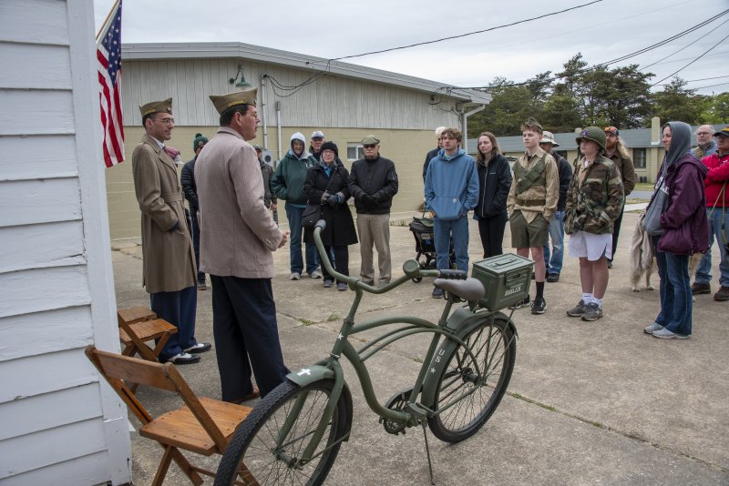 A crowd gathers to learn about hometown aircraft warnings at Fort Miles Defense Day.